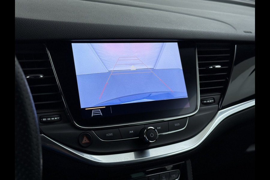 Opel Astra Sports Tourer 1.2T Leer/Alcantara Led-Matrix Innovation Bose®-Hifi Navi Camera Park-Assist + PDC-a+v Apple Carplay Android Keyle AGR-Comfort-Stoel+Stuur+Voorruitverwarming Elek.Achterklep Pdc Lane Assist DAB Regen-Lichtsensor Bordherkenning Zwarte-Hemel Origineel Nederlandse Auto Zeer luxe uitvoering! A-Label EURO6  € 30.000 nieuw