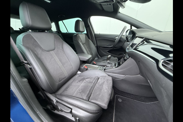 Opel Astra Sports Tourer 1.2T Leer/Alcantara Led-Matrix Innovation Bose®-Hifi Navi Camera Park-Assist + PDC-a+v Apple Carplay Android Keyle AGR-Comfort-Stoel+Stuur+Voorruitverwarming Elek.Achterklep Pdc Lane Assist DAB Regen-Lichtsensor Bordherkenning Zwarte-Hemel Origineel Nederlandse Auto Zeer luxe uitvoering! A-Label EURO6  € 30.000 nieuw