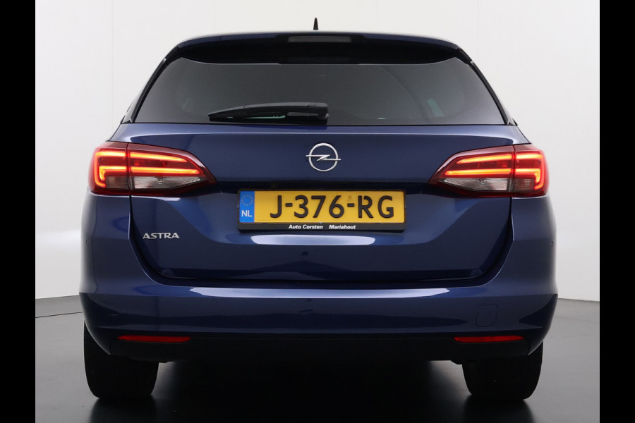 Opel Astra Sports Tourer 1.2T Leer/Alcantara Led-Matrix Innovation Bose®-Hifi Navi Camera Park-Assist + PDC-a+v Apple Carplay Android Keyle AGR-Comfort-Stoel+Stuur+Voorruitverwarming Elek.Achterklep Pdc Lane Assist DAB Regen-Lichtsensor Bordherkenning Zwarte-Hemel Origineel Nederlandse Auto Zeer luxe uitvoering! A-Label EURO6  € 30.000 nieuw