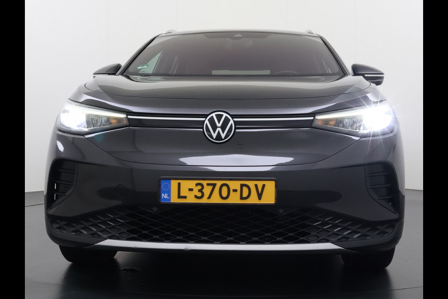 Volkswagen ID.4 204pk 1st 77kWh Trekhaak Leer/Alcantara Adap.Cruise Camera Warmtepomp Apple Carplay Android Navi Ecc Pdc-a+v Lmv 20" Stoelverwarming Led Bordherkenning Voor-Klimatisering Semi-Autopilot  Elektrisch-Wegklapbare Trekhaak App-Connect  E-sound Front-Assist Origineel Nederlandse Auto SOH 86%