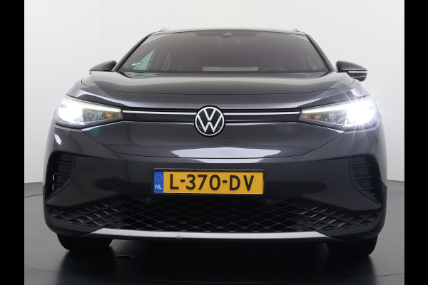 Volkswagen ID.4 204pk 1st 77kWh Trekhaak Leer/Alcantara Adap.Cruise Camera Warmtepomp Apple Carplay Android Navi Ecc Pdc-a+v Lmv 20" Stoelverwarming Led Bordherkenning Voor-Klimatisering Semi-Autopilot  Elektrisch-Wegklapbare Trekhaak App-Connect  E-sound Front-Assist Origineel Nederlandse Auto SOH 86%