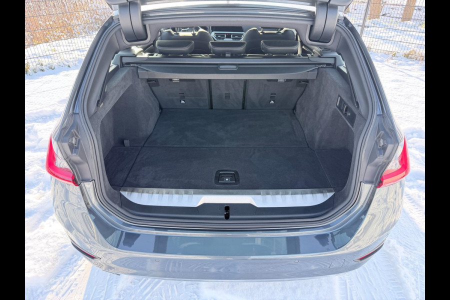 BMW 3 Serie Touring 320e Business Edition Plus | Carplay | Sportstoelen | EL trekhaak | Full Leder |