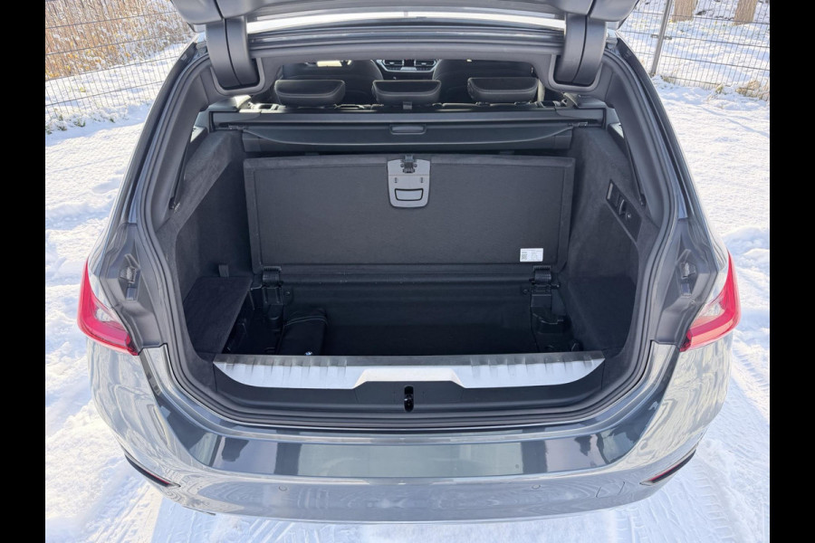 BMW 3 Serie Touring 320e Business Edition Plus | Carplay | Sportstoelen | EL trekhaak | Full Leder |