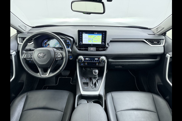 Toyota RAV4 2.5I 218PK Hybrid Automaat Leder Apple Carplay Android Auto Navi Dual Ecc JBL®-Audio Adap.Cruise Camera Business Plus Keyless Elek.Achterklep Stoelverwarming Elek.Stoel Lane Assist Wifi Led Lmv 18" Regensensor DAB 1e Eigenaar Origineel Nederlandse Auto