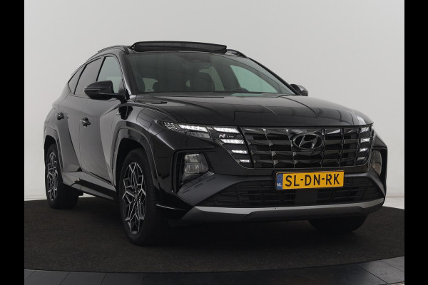 Hyundai Tucson 1.6 T-GDI PHEV N Line Sky 4WD | Panoramadak | Stoelverwarming | Leder/Alcantara | Camera | Adaptive cruise | Carplay | Full LED | Stuurverwarming | Keyless | Plug In