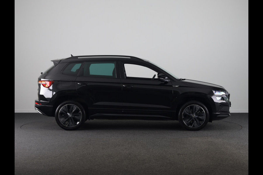 Škoda Karoq 1.5 TSI ACT Sportline Business 150 pk Automaat (DSG) | Verlengde garantie | Navigatie via App | Parkeersensoren | Achteruitrijcamera | Adaptieve cruise control | Stoelverwarming |