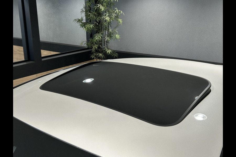 Mercedes-Benz CLS-Klasse 450 4Matic AMG // Burmester // 360 Camera // Sunroof // Trekhaak // 20 inch // Designo White // Distronic