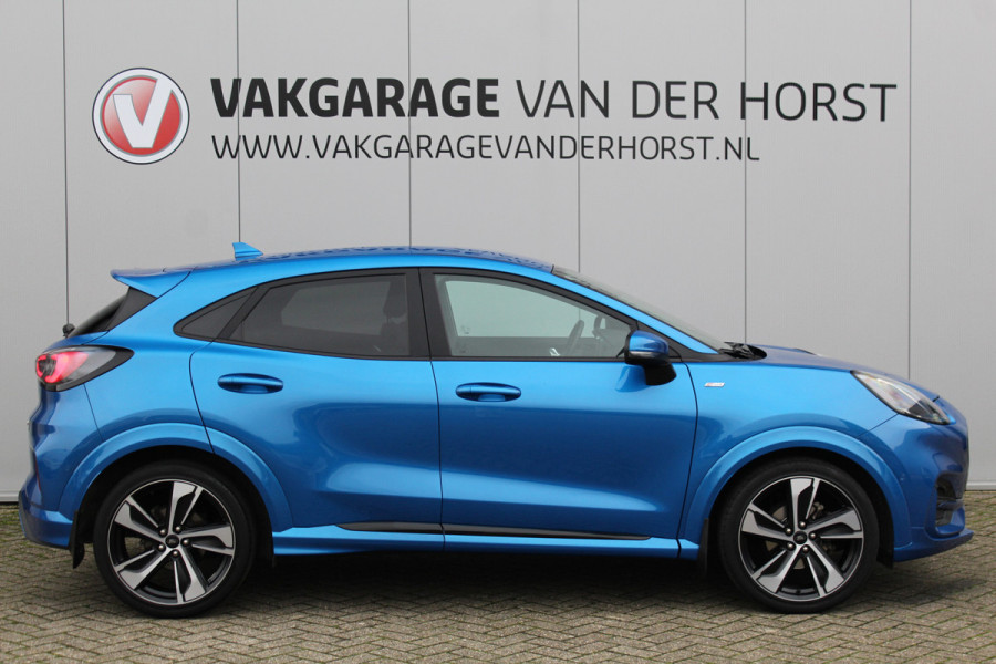Ford Puma 1.0-155pk EcoBoost Hybrid ST-Line X. Erg mooi, nette, luxe en sportieve Ford Puma ! Autm. airco, stoel-, stuur- en voorraamverw., camera, elektr. achterkl., trekhaak+afneemb. kogel, B&O soundsyst., lane- en side assist, adapt. cruise cntrl, LED verl. etc.