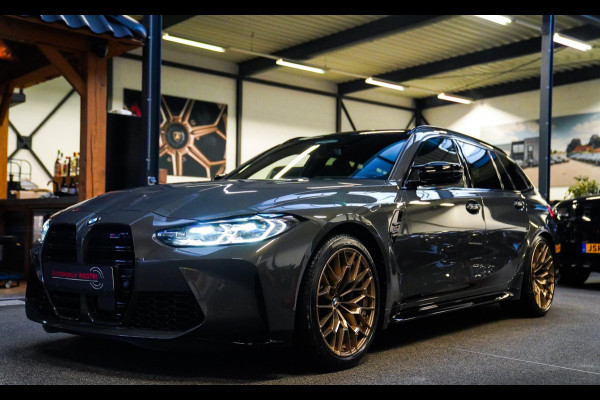 BMW 3 Serie Touring M3 xDrive Competition | Schaalstoelen kyalami oranje | BTW | Laser | Adaptieve Cruise | Carbon | Dravit Grau |