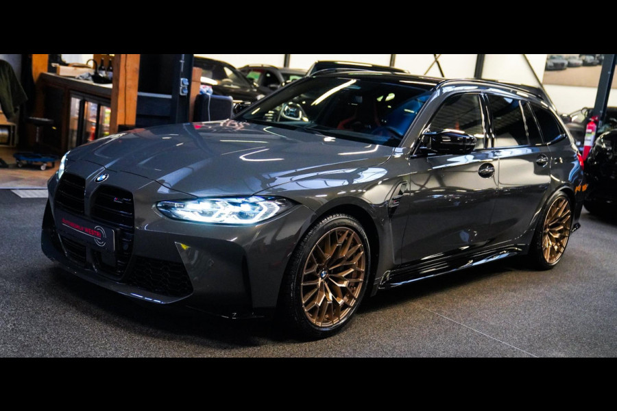 BMW 3 Serie Touring M3 xDrive Competition | Schaalstoelen kyalami oranje | BTW | Laser | Adaptieve Cruise | Carbon | Dravit Grau |