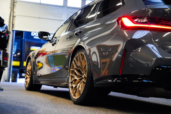 BMW 3 Serie Touring M3 xDrive Competition | Schaalstoelen kyalami oranje | BTW | Laser | Adaptieve Cruise | Carbon | Dravit Grau |