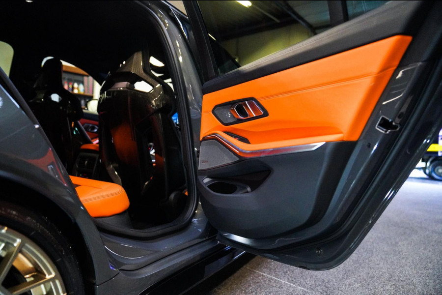 BMW 3 Serie Touring M3 xDrive Competition | Schaalstoelen kyalami oranje | BTW | Laser | Adaptieve Cruise | Carbon | Dravit Grau |