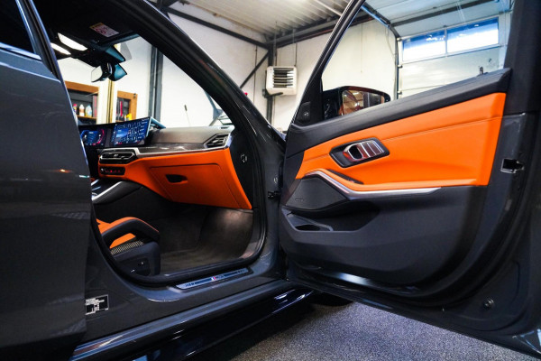 BMW 3 Serie Touring M3 xDrive Competition | Schaalstoelen kyalami oranje | BTW | Laser | Adaptieve Cruise | Carbon | Dravit Grau |