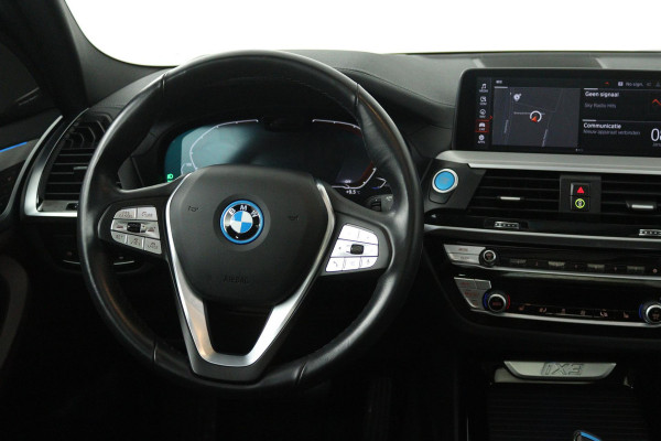 BMW iX3 High Executive 80 kWh (PANORAMADAK, SoH 97.7% TREKHAAK, SFEERVERLICHTING, STOELVERWARMING, ACHTERUITRIJCAMERA, NAVIGATIE)