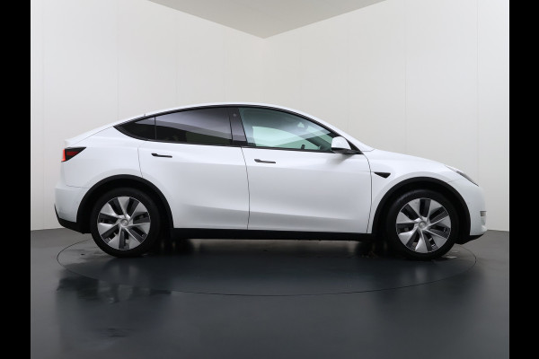 Tesla Model Y Long Range AWD 75kWh Trekhaak SOH 91% Warmtepomp Autopilot Leder Panoramadak Elektr.Stuur+Stoel+Verwarmd Navi Ecc Premium Audio  4WD Camera's Elektr.AchterKlep Parkeer Assistent Sentry-Mode Bluetooth Dodehoek detector Connected services AMD-Ryzen Processor™ 1e Eigenaar 1.600kg Trekvermogen Origineel Nederlandse Auto Garantie op Batterij en Motor tot 29-6-2030 max. 192.000km