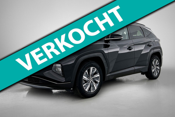 Hyundai Tucson 1.6 T-GDI HEV Comfort Automaat (TREKHAAK, NAVIGATIE, TREKHAAK, CARPLAY, STOELVERWARMING, CAMERA, 1e EIGENAAR)