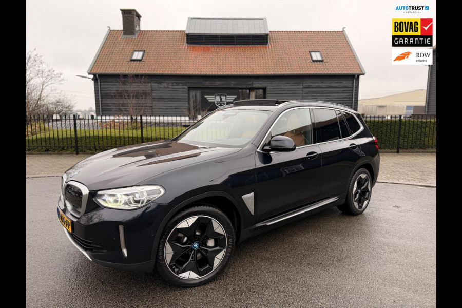 BMW iX3 High Executive 80 kWh SOH 97% PANORAMADAK/HEAD-UP/HARMANKARDON/ /TREKHAAK/LEER FULL-LED/360" CAMERA |