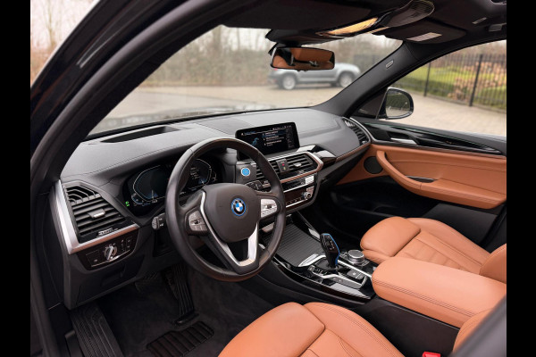 BMW iX3 High Executive 80 kWh SOH 97% PANORAMADAK/HEAD-UP/HARMANKARDON/ /TREKHAAK/LEER FULL-LED/360" CAMERA |