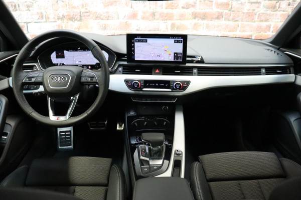Audi A4 Avant 35 TFSI S Edition Competition Automaat / Panoramadak / Optic Black / Adaptieve Cruise Control / 18 Inch / LED / Stoelverwarming / Navigatiesysteem / Achteruitrijcamera / Extra Getint Glas / Climate Control