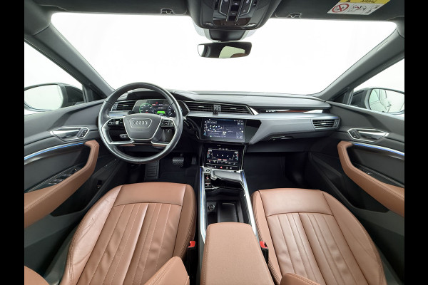 Audi e-tron 55 Quattro 95kWh 408PK Elektr.Leer+Verwarmd Pano-Dak Trekhaak Luchtvering Adap.Cruise Navi Ecc Stoelverwarming Business edition  SOH 93% LED Lmv Elek.Achterklep Privacy Glas Keyless Zwarte Hemel 1e Eigenaar 1.800KG Trekgewicht Zeer compleet! Volledig Dealer Onderhouden, net Beurt gehad bij Audi!