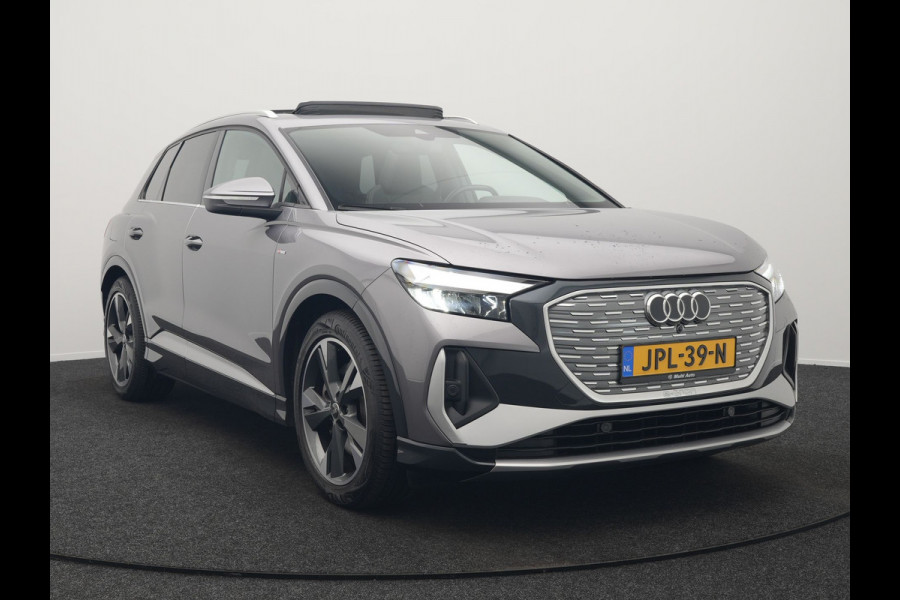 Audi Q4 e-tron 50 quattro S-Line 77 kWh 299pk Dealer O.H. Incl. BTW | Panodak | SOH 93,2% | Lederen Sportstoelen Verwarmd | 20"L.M  | Navigatie | Cruise Control | Virtual | DAB | Taifungrau Metallic |
