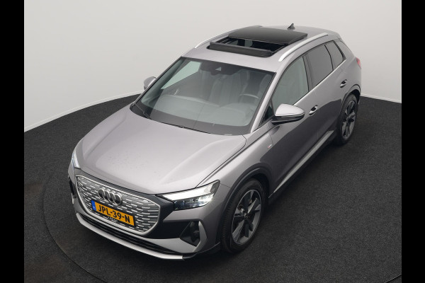 Audi Q4 e-tron 50 quattro S-Line 77 kWh 299pk Dealer O.H. Incl. BTW | Panodak | SOH 93,2% | Lederen Sportstoelen Verwarmd | 20"L.M  | Navigatie | Cruise Control | Virtual | DAB | Taifungrau Metallic |