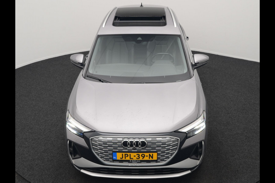 Audi Q4 e-tron 50 quattro S-Line 77 kWh 299pk Dealer O.H. Incl. BTW | Panodak | SOH 93,2% | Lederen Sportstoelen Verwarmd | 20"L.M  | Navigatie | Cruise Control | Virtual | DAB | Taifungrau Metallic |