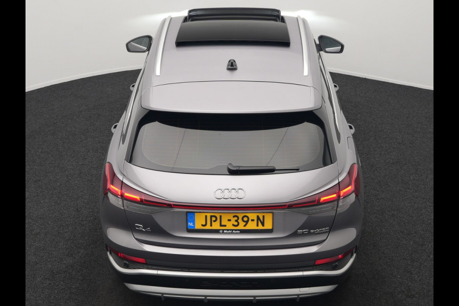 Audi Q4 e-tron 50 quattro S-Line 77 kWh 299pk Dealer O.H. Incl. BTW | Panodak | SOH 93,2% | Lederen Sportstoelen Verwarmd | 20"L.M  | Navigatie | Cruise Control | Virtual | DAB | Taifungrau Metallic |
