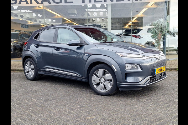 Hyundai Kona EV Premium 64 kWh | SOH: 94,6% | Leder | Warmtepomp | Adaptive CC | Navi | Camera |