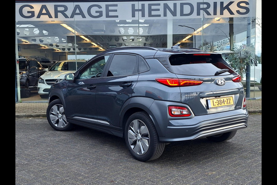 Hyundai Kona EV Premium 64 kWh | SOH: 94,6% | Leder | Warmtepomp | Adaptive CC | Navi | Camera |