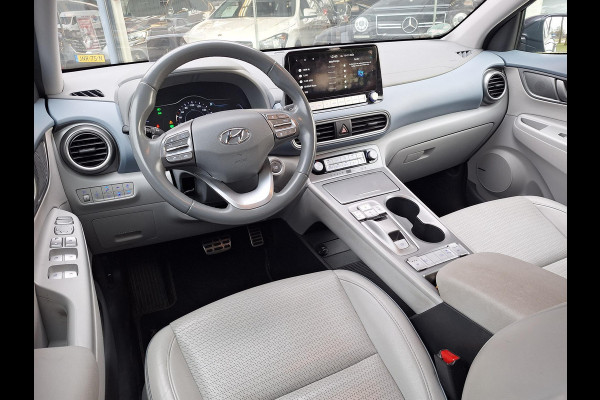 Hyundai Kona EV Premium 64 kWh | SOH: 94,6% | Leder | Warmtepomp | Adaptive CC | Navi | Camera |