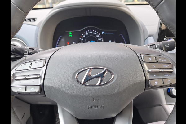 Hyundai Kona EV Premium 64 kWh | SOH: 94,6% | Leder | Warmtepomp | Adaptive CC | Navi | Camera |