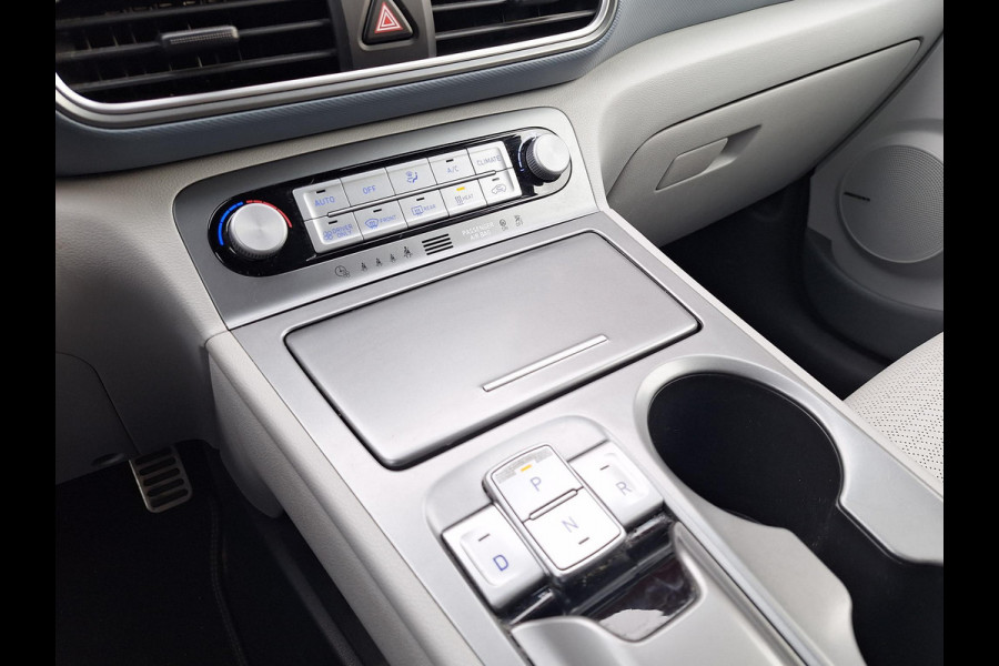 Hyundai Kona EV Premium 64 kWh | SOH: 94,6% | Leder | Warmtepomp | Adaptive CC | Navi | Camera |
