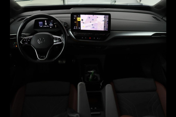 Volkswagen ID.4 First Max 77 kWh | Panoramadak | Stoelverwarming | Head-Up | Trekhaak | 360 Camera | Sfeerverlichting | Half leder | Matrix LED | Carplay | Adaptive cruise | Memory | Keyless | Massage