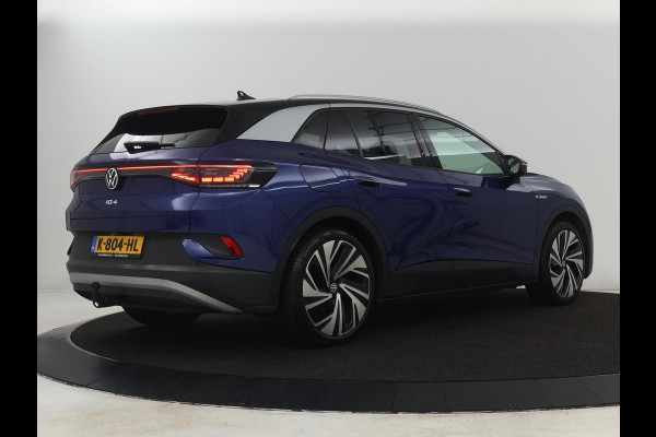 Volkswagen ID.4 First Max 77 kWh | Panoramadak | Stoelverwarming | Head-Up | Trekhaak | 360 Camera | Sfeerverlichting | Half leder | Matrix LED | Carplay | Adaptive cruise | Memory | Keyless | Massage