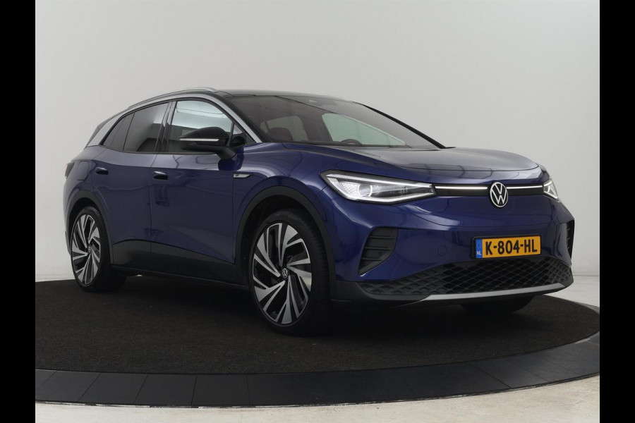 Volkswagen ID.4 First Max 77 kWh | Panoramadak | Stoelverwarming | Head-Up | Trekhaak | 360 Camera | Sfeerverlichting | Half leder | Matrix LED | Carplay | Adaptive cruise | Memory | Keyless | Massage