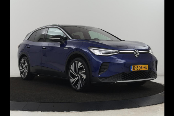 Volkswagen ID.4 First Max 77 kWh | Panoramadak | Stoelverwarming | Head-Up | Trekhaak | 360 Camera | Sfeerverlichting | Half leder | Matrix LED | Carplay | Adaptive cruise | Memory | Keyless | Massage