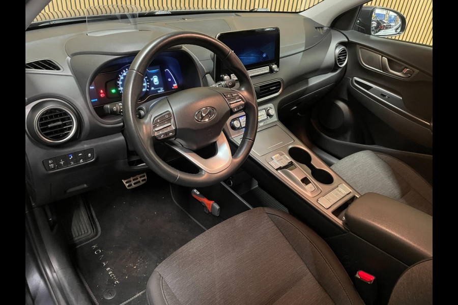 Hyundai Kona EV Fashion 64 kWh|100% SOH|FACELIFT|3-FASE|ACC|NAVI|CAMERA|CARPLAY|NAVI|NL- AUTO|NAP|INCL. BTW|1e EIG.|