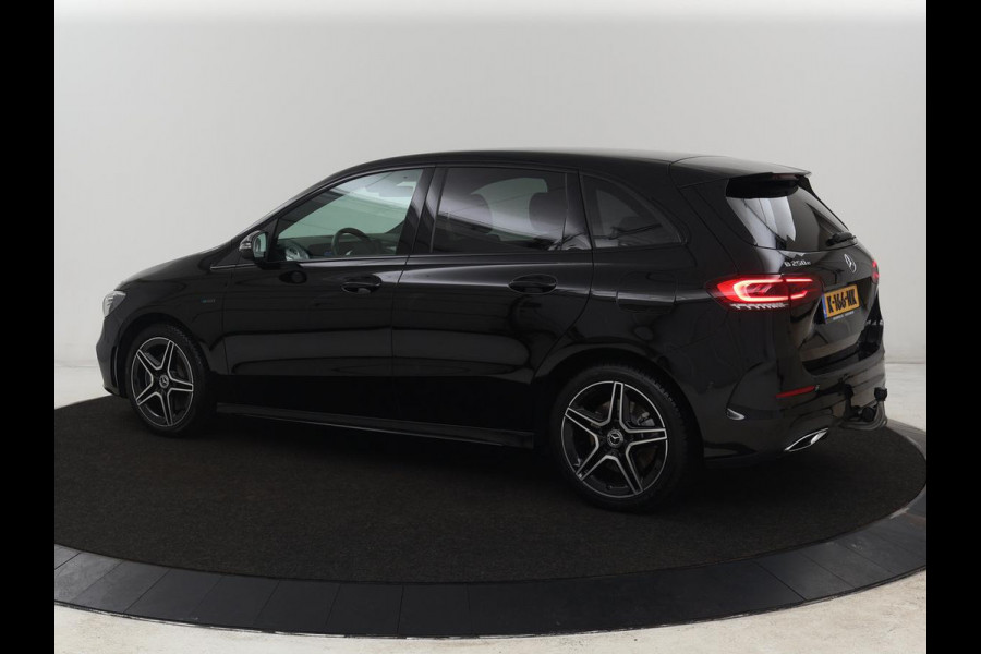 Mercedes-Benz B-Klasse 250e AMG | Trekhaak | Carplay | Stoelverwarming | Leder/Alcantara | Camera | Widescreen | Full LED | Navigatie | Park Assist | Climate control | Cruise control | PHEV | Plug In
