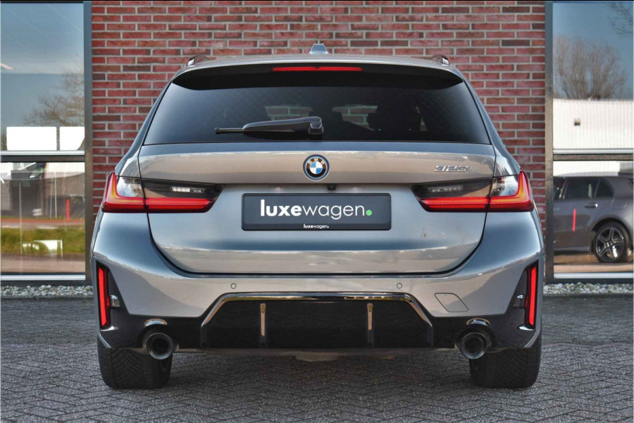 BMW 3 Serie Touring 320i M-Sport Pro Pano HUD HiFi Camera