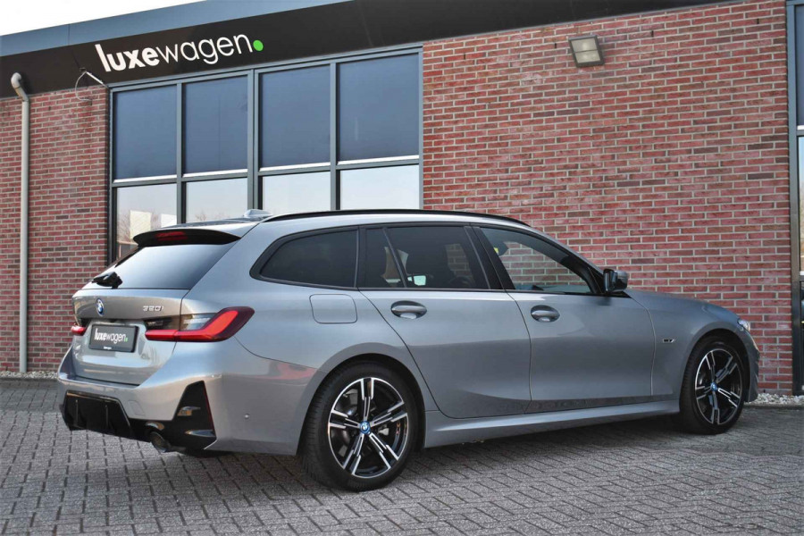 BMW 3 Serie Touring 320i M-Sport Pro Pano HUD HiFi Camera