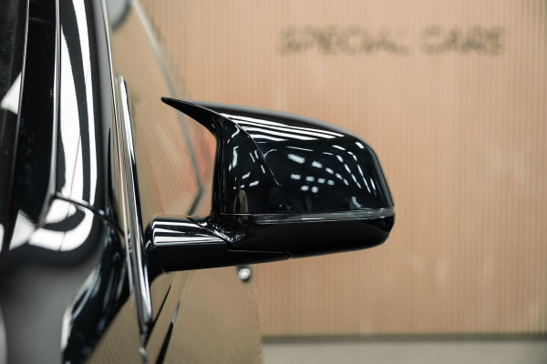 BMW X5 xDrive45e High Executive | M uitgevoerd | Stoelmassage | Sky Lounge | Head-Up | Carbon |