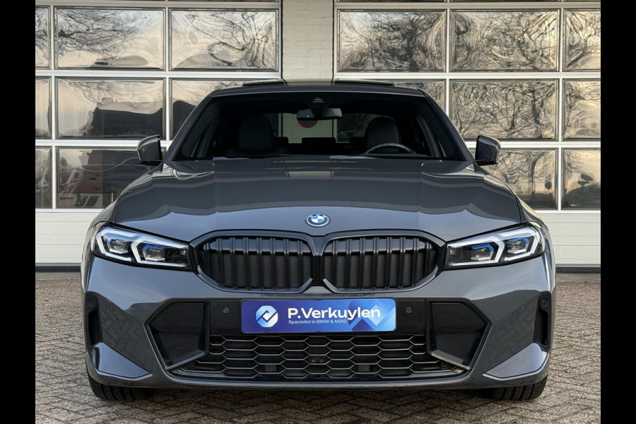 BMW 3-serie 320e M SPORT | 19 INCH VELGEN | PANORAMA | M SPORT REMMEN | TREKHAAK | ELEKTR. STOELEN MEMORY |
