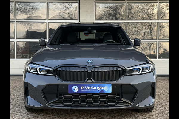 BMW 3-serie 320e M SPORT | 19 INCH VELGEN | PANORAMA | M SPORT REMMEN | TREKHAAK | ELEKTR. STOELEN MEMORY |