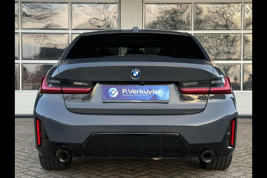 BMW 3-serie 320e M SPORT | 19 INCH VELGEN | PANORAMA | M SPORT REMMEN | TREKHAAK | ELEKTR. STOELEN MEMORY |