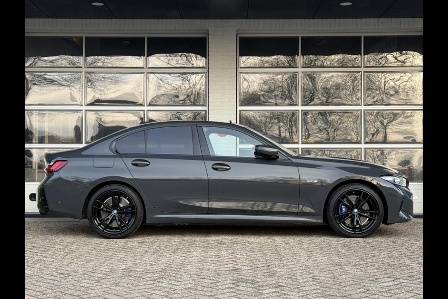 BMW 3-serie 320e M SPORT | 19 INCH VELGEN | PANORAMA | M SPORT REMMEN | TREKHAAK | ELEKTR. STOELEN MEMORY |