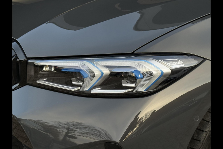 BMW 3-serie 320e M SPORT | 19 INCH VELGEN | PANORAMA | M SPORT REMMEN | TREKHAAK | ELEKTR. STOELEN MEMORY |