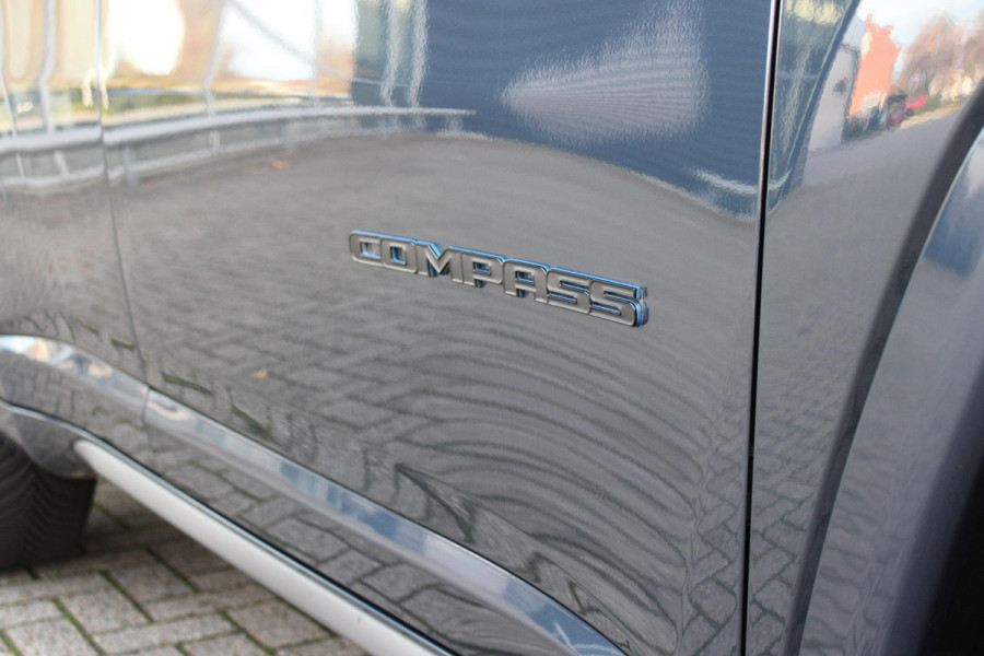 Jeep Compass 4xe 240PK Plug-in Hybrid ELECTRIC S | PANORAMSICH SCHUIF/KANTEL DAK | STOEL/STUUR VERWARMING | ALL SEASON BANDEN | 19" LICHTMETALEN VELGEN "GLOSSY BLACK" | ELEKTRISCH BEDIENBARE BESTUURDERSSTOEL | LEDEREN BEKLEDING | ADAPTIVE CRUISE CONTROL | NAVIGATIE | DRAADLOZE APPLE CARPLAY/ANDROID AUTO | DRAADLOZE TELEFOONLADER | DAB+ RADIO | ELEKTRISCH BEDIENBARE ACHTERKLEP | ACHTERUITRIJ CAMERA | KEYLESS ENTRY/START |