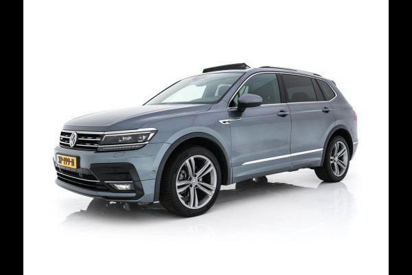 Volkswagen Tiguan Allspace 1.5 TSI R-line Highline Business (7-Pers.) (INCL-BTW) Aut * PANO | NAVI-FULLMAP | XENON | ALCANTARA | HEATED-ERGONOMIC-SPORTSEATS | KEYLESS | PRIVACY-GLASS | CAMERA | DAB | DIGI-COCKPIT | PDC | TOWBAR | ECC | 19"ALU*