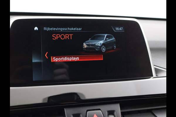 BMW X1 sDrive18i AUT. SPORTLINE + TREKHAAK | LED | SPORTSTOELEN | STOELVERWARMING | NAVIGATIE